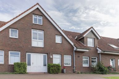 Ferienwohnung 50157 Sandbank - Die Urlaubswohnung Sandbank im Haus „Seeblick“ im Nordseeheilbad Carolinensiel liegt in unmittelbarer Nähe der „Friedrichsschleuse“ an der „Harle“.
