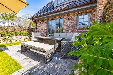 Haus Rosi - Ferienhaushälfte in Westerland mit Sauna und Garten. Haustiere sind Willkommen.