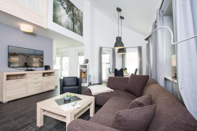 Feriendorf Südstrand - Luxuriöses Haus für 6-8 Personen und Hund mit Sauna, Kamin, Garten und Spielgerüst