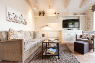Haus Sonnenstrahl, Strandhaus - Schöne 3-Zimmer-Ferienwohnung im Erdgeschoss auf ca. 54 m² für bis zu 4 Personen