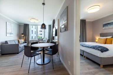 Ferienwohnungen am Godewindpark Travemünde - Modernes 2-Zimmer-Apartment nahe Ostseestrand mit Balkon und Wellnesszugang