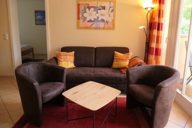 Dünenschloss - Gemütliche 3-Zimmer-Ferienwohnung mit Südbalkon für 4 Personen