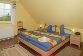 Wohnbeispiel - Schlafzimmer mit Ehebett