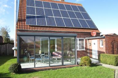 Ferienhaus mit Wintergarten und Garten am Deich