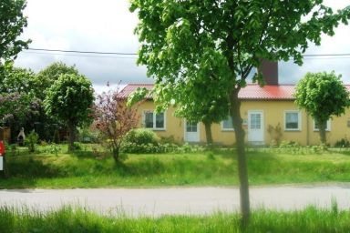 Ferienwohnung mit Sitzecke im Grünen.