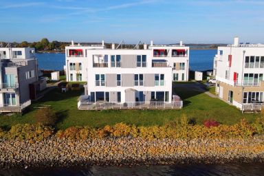 Ferienwohnung in Olpenitzdorf mit Terrasse und Whirlpool und Seeblick