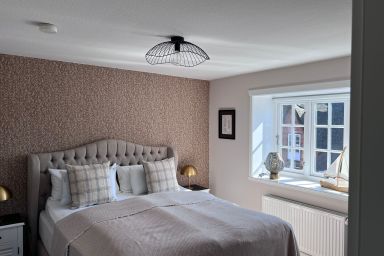 GUNDT Amrum - Ferienwohnung Leuchtturm