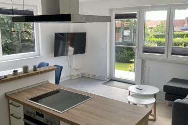 Ferienwohnung Brandung - Haus Seeschwalbe - Ferienwohnung Brandung mit 50qm, 1 Schlafzimmer, Balkon mit Blick in Garten, max. 2 Personen