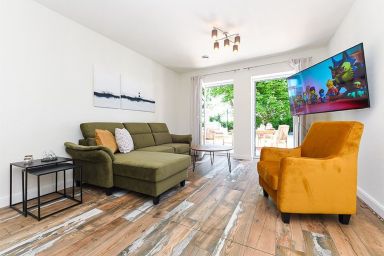 Hof zwischen den Deichen im Wangerland - Ferienwohnung Treckerschuppen