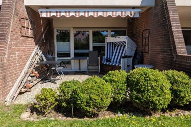 Nord Nord West - Ferienwohnung Nord Nord West -  mit eigenem Strandkorb auf der Terrasse