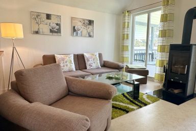 Ostseepark Rügen - Familienfreundliches Apartment mit Infrarotsauna, Kamin & Balkon in Strandnähe