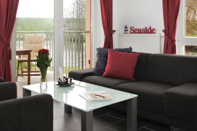 NordseeResort Friesland - Apartment mit Sauna, Whirlbadewanne und Balkon an der Graft mit Blick zum Deich!