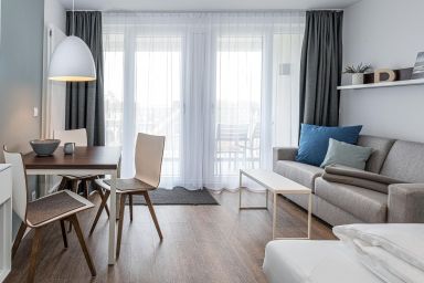 Deichhäuser Anna Küste - Strandnahes Ferienapartment mit Balkon, Parkplatz, Schwimmbad- & Saunanutzung