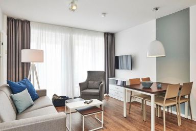 Deichhäuser Anna Küste - Tolles, strandnahes Apartment mit zwei Balkonen inkl. Schwimmbad- & Saunanutzung