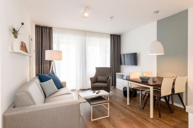 Deichhäuser Anna Küste - Tolles 3-Zimmer Ferienapartment in ruhiger Lage mit zwei Balkonen in Strandnähe