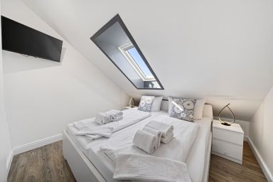 Berliner Ring - Gemütliche Ferienwohnung in ruhiger, strandnaher Lage für bis zu vier Personen.