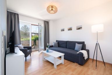 Ferienanlage Lemkenhafen - Ferienwohnung "Kiter" für 4 Gäste und Hund mit schöner Terrasse - Ostseenah!
