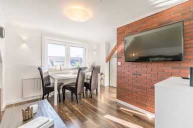 Haus Wellen und Meer - Maritime Ferienwohnung für 4 Personen in Hafennähe