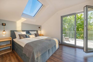 Ferienhaus "Haffhus" mit Balkon, Terrasse und 2 Bädern - Modernes Ferienhaus "Haffhus" für bis zu 10 Personen mit Garten und Balkon