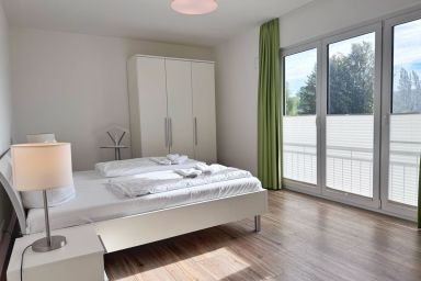 Moderne Erdgeschosswohnung mit 3 Schlafzimmern und Kamin - Mein Glowe - EG links