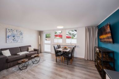 Ferienwohnung Waldhaus 2.2 mit großer Sonnenterrasse und Grill - Gemütliches Ferienhaus in Korswandt mit Garten & WLAN – ideal für Paare