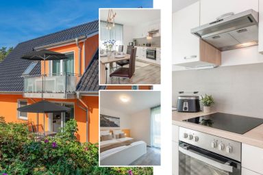 Ferienhaus Abendrot OG - Moderne Ferienwohnung in Loddin mit Garten – Familienfreundlich & ruhig gelegen