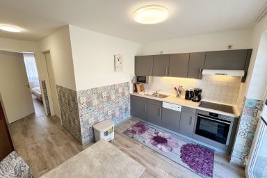 MR: Haus Inselperle mit Blick auf den Bodden - Wohnung 03 mit Terrasse und Boddenblick