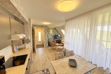 MR: Haus Inselperle mit Blick auf den Bodden - Wohnung 05 mit Balkon und Boddenblick
