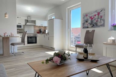Haus Nordseekrabbe - Ferienwohnung Pewsum