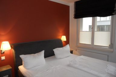 Kapitänshaus - 3 Zimmer-Ferienwohnung mit Balkon