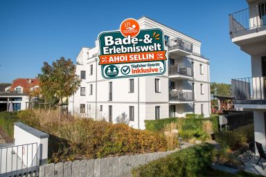 Ferienwohnung Enzian - Sauna, E-Ladestation & 150m zum Strand - Bade- & Erlebniswelt täglich inklusive