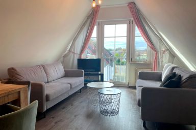 Hafenstrasse 34 - Wohnung 8 - Komfortable Ferienwohnung in Zingst mit Parkplatz, 3 Schlafzimmern und WLAN