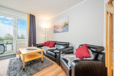 Hus Inselkieker - Familien-Maisonettewohnung an der Nordsee mit Balkon und Blick zum grünen Deich