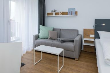 Deichhäuser Anna Küste - 1-Zimmer-Apartment, strandnah, mit Balkon, Parkplatz, Schwimmbad- & Saunanutzung