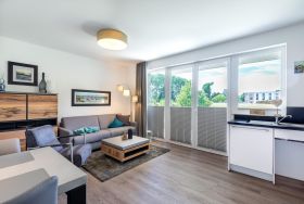Wohn-/Essbereich mit Zugang zur Terrasse