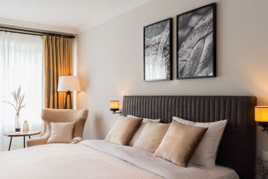 Hochwertige Ferienwohnung mit Sonnenterrasse & Gartenblick, nur wenige Gehminuten zum Strand - Ferienappartement in Strandnähe mit Terrasse und Gartenblick