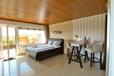 Fischer - Praktisches Appartement in strandnaher Lage inmitten einer Heidelandschaft.