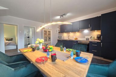 Friesenkate Steuerbord - Friesenkate Steuerbord: Moderne  Unterkunft mit eingezäuntem Garten