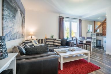 Haus Wellen und Meer - Maritime Ferienwohnung für 4 Personen in Hafennähe