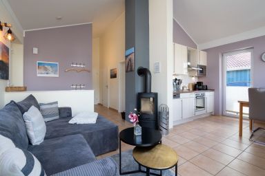 Feriendorf Südstrand - Strandnahes Ferienhaus für 4 Personen und Hund mit Sauna, Kamin und umzäunten Garten