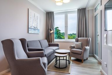 Ferienwohnungen am Godewindpark Travemünde - Komfortables Apartment mit überdachtem Balkon und Wellnessbereich in Travemünde