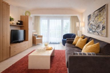 Wohnung Strandgut - 45 m² Erdgeschosswohnung für 2+1 Personen mit Terrasse in Bungalowanlage