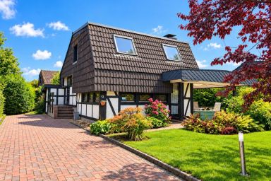 Ferienhaus KÜSTENKIND in Burhave - Erleben Sie Erholung pur im familienfreundlichen Ferienhaus KÜSTENKIND in Burhave