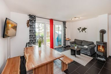 Ferienhaus Kontraste - Modernes Ferienhaus Kontraste in Korswandt mit Sauna und Gartenterrasse