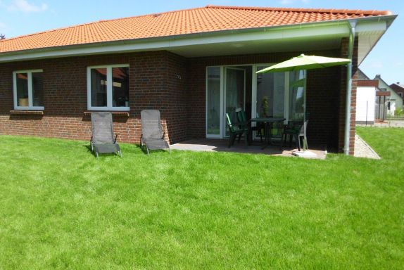Terrasse mit Liegewiese