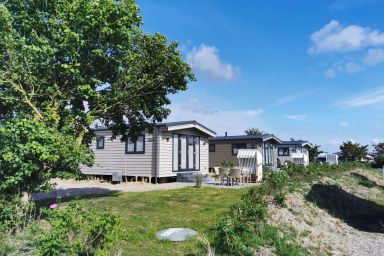 Camping- und Ostseeferienpark Walkyrien - Lotsenhaus mit teilweise eingezäuntem Garten