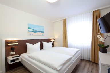 Park-Ferienwohnungen Ostseebad Sellin 500 m zum Strand - 2-Raum-Ferienwohnung mit Balkon 446