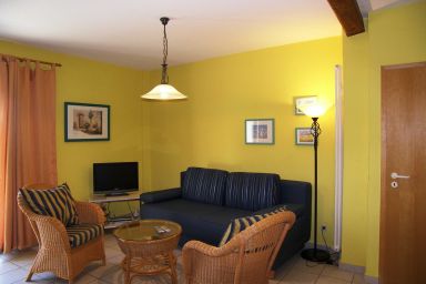 Reetgedecktes Ferienhaus Greiser - Ferienwohnung