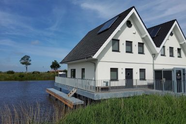 Nr. 110 - Ferienhaus Seeperle / Pfahlhaus auf der Harle - Nr. 110 - Exklusives Wohnen auf der Harle 4P