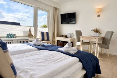 Seestern - Helles App. für 2 Pers. - Balkon, Stellplatz, WLAN. Haustiere erlaubt.